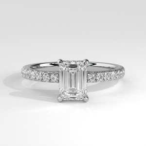 Emerald-cut pavé cathedral solitaire engagement ring with open gallery