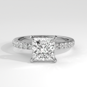 Princess cut engagement ring with pavé band and four-prong setting