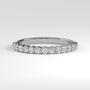 Slim half-eternity diamond band with round stones in shared prong setting