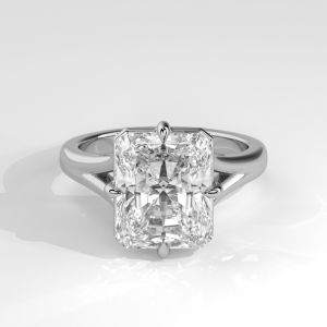 Radiant cut solitaire engagement ring with cathedral shank and polished band