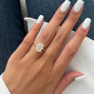 Rectangular cushion solitaire engagement ring with polished band and four prong setting