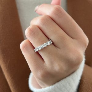 Classic round diamond eternity band with shared prong setting