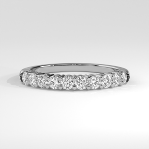 Refined half eternity band with round diamonds in a shared prong setting