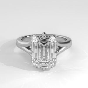 Emerald cut solitaire engagement ring with cathedral shoulders and open gallery