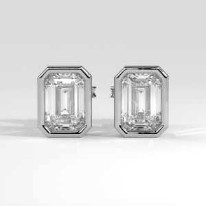 Refined round diamond solitaire engagement ring with four-prong setting and polished plain band