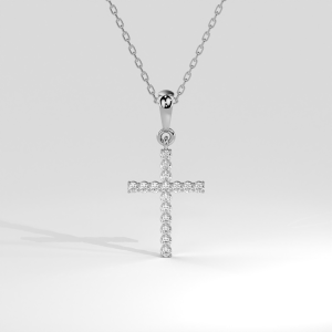 Round diamond cross pendant with sixteen prong-set stones