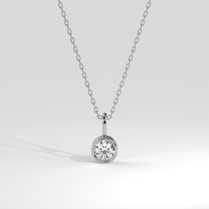 Round bezel set diamond pendant with fine chain