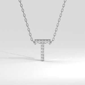 Pavé diamond 'T' initial pendant necklace with round stones on a delicate chain